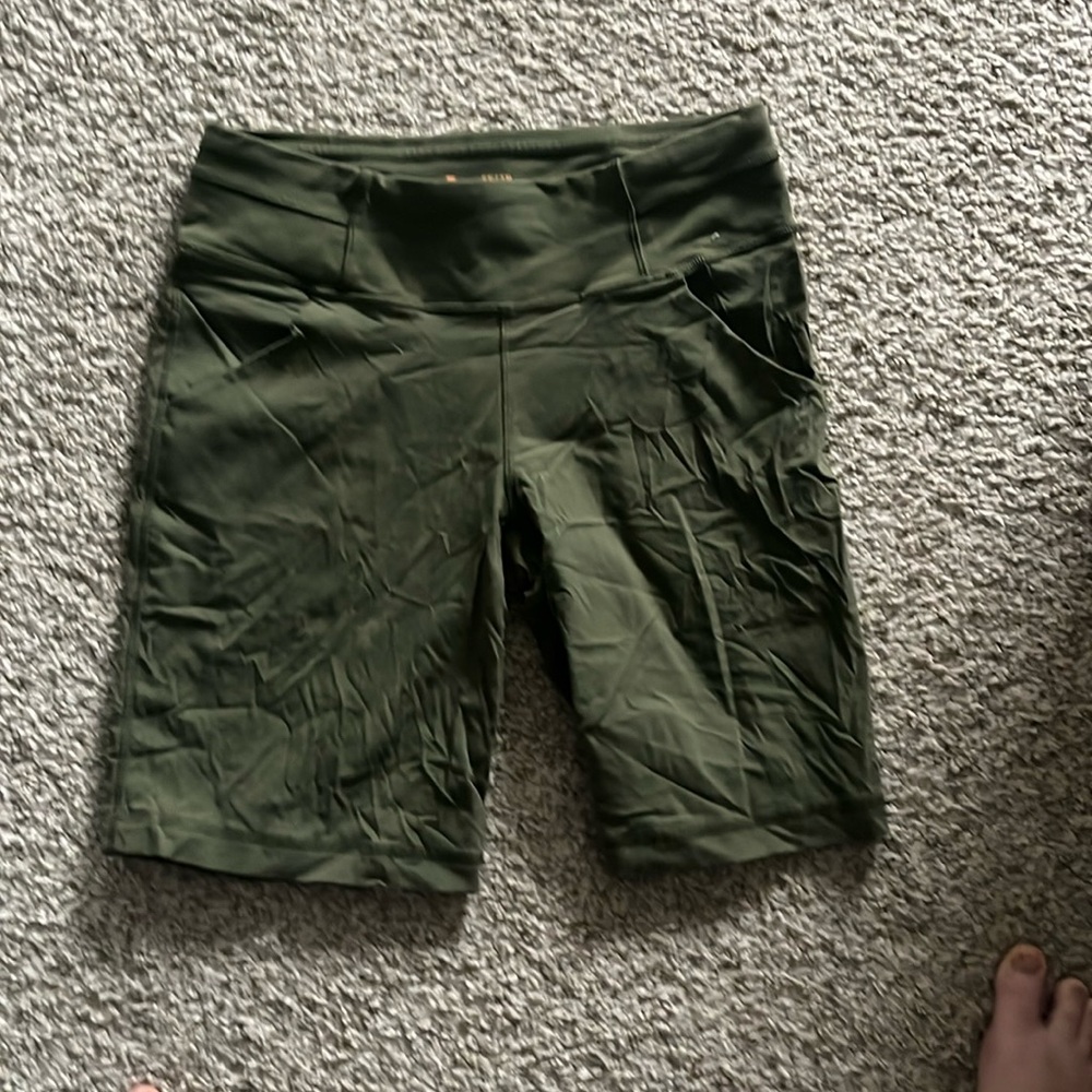 Green athletic shorts